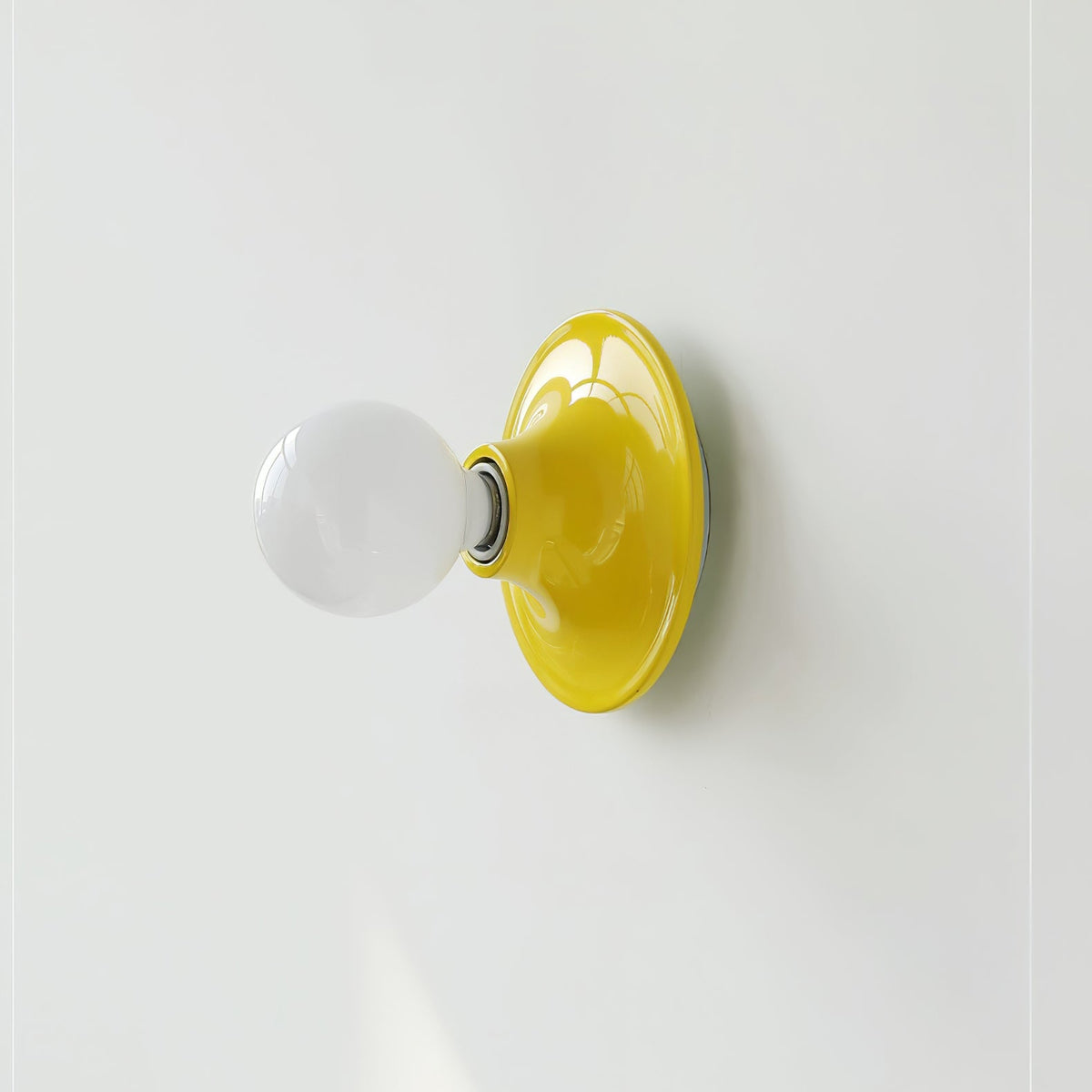 Eclipta Wall Sconce – Sculptural Metal & Glass Halo Light for Modern Interiors
