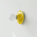 Eclipta Wall Sconce – Sculptural Metal & Glass Halo Light for Modern Interiors
