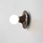 Eclipta Wall Sconce – Sculptural Metal & Glass Halo Light for Modern Interiors