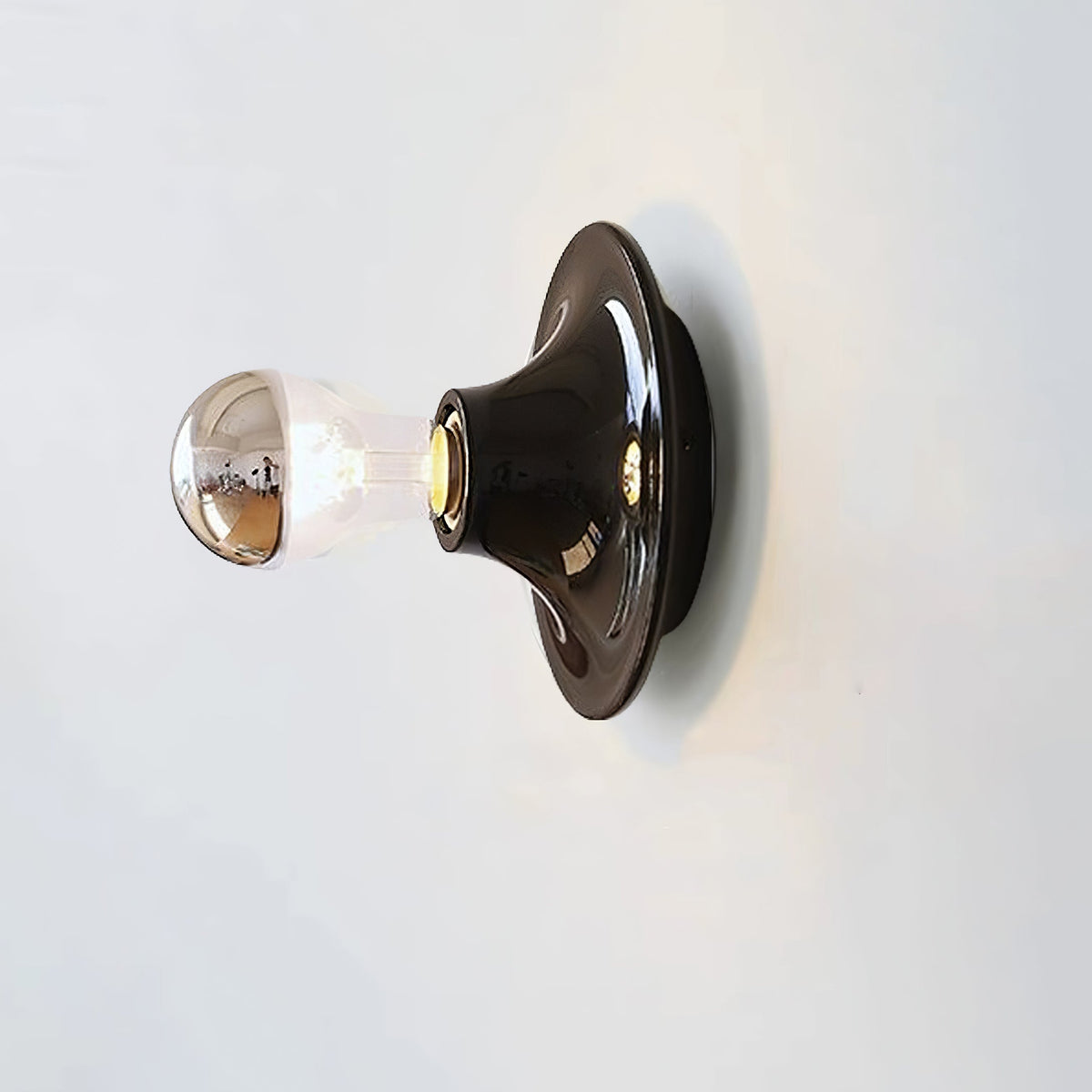 Eclipta Wall Sconce – Sculptural Metal & Glass Halo Light for Modern Interiors