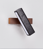 Elias Wall Sconce in Black Travertine and Walnut Wood