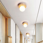 Elira Travertine Flush Mount Ceiling Light with Opal Glass Globe