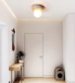 Elira Travertine Flush Mount Ceiling Light with Opal Glass Globe