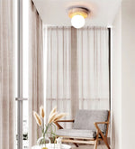 Elira Travertine Flush Mount Ceiling Light with Opal Glass Globe