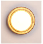 Elira Wall Sconce in Yellow Travertine with Opal Glass Shade