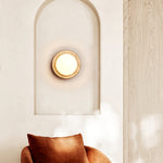 Elira Wall Sconce in Yellow Travertine with Opal Glass Shade