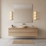 Elysian Travertine Wall Sconce with Glass Globes – Modern Natural Stone Lighting