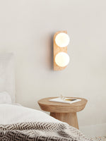 Elysian Travertine Wall Sconce with Glass Globes – Modern Natural Stone Lighting