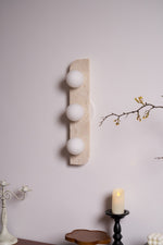 Elysian Travertine Wall Sconce with Glass Globes – Modern Natural Stone Lighting