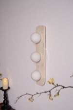 Elysian Travertine Wall Sconce with Glass Globes – Modern Natural Stone Lighting