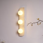Elysian Travertine Wall Sconce with Glass Globes – Modern Natural Stone Lighting