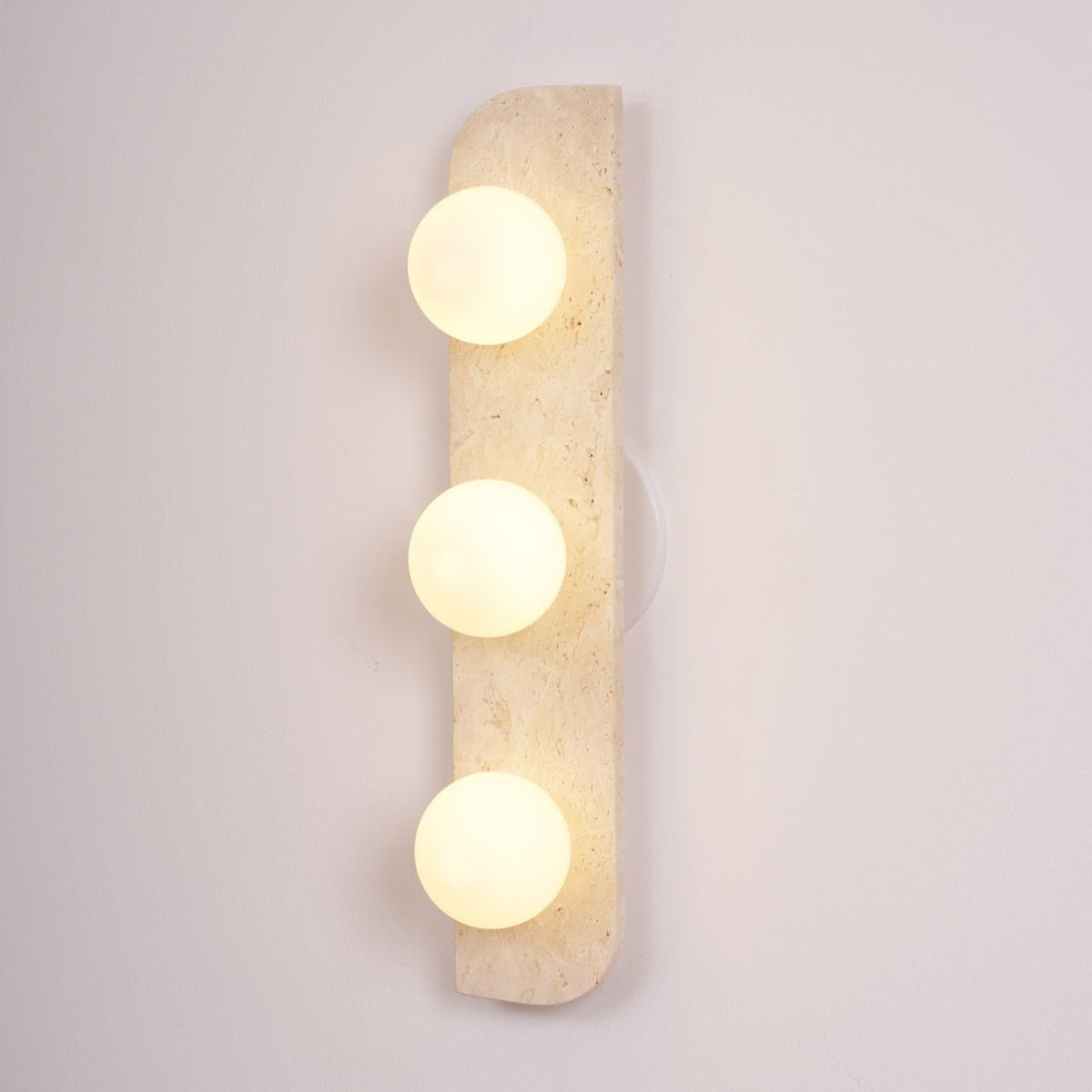 Elysian Travertine Wall Sconce with Glass Globes – Modern Natural Stone Lighting