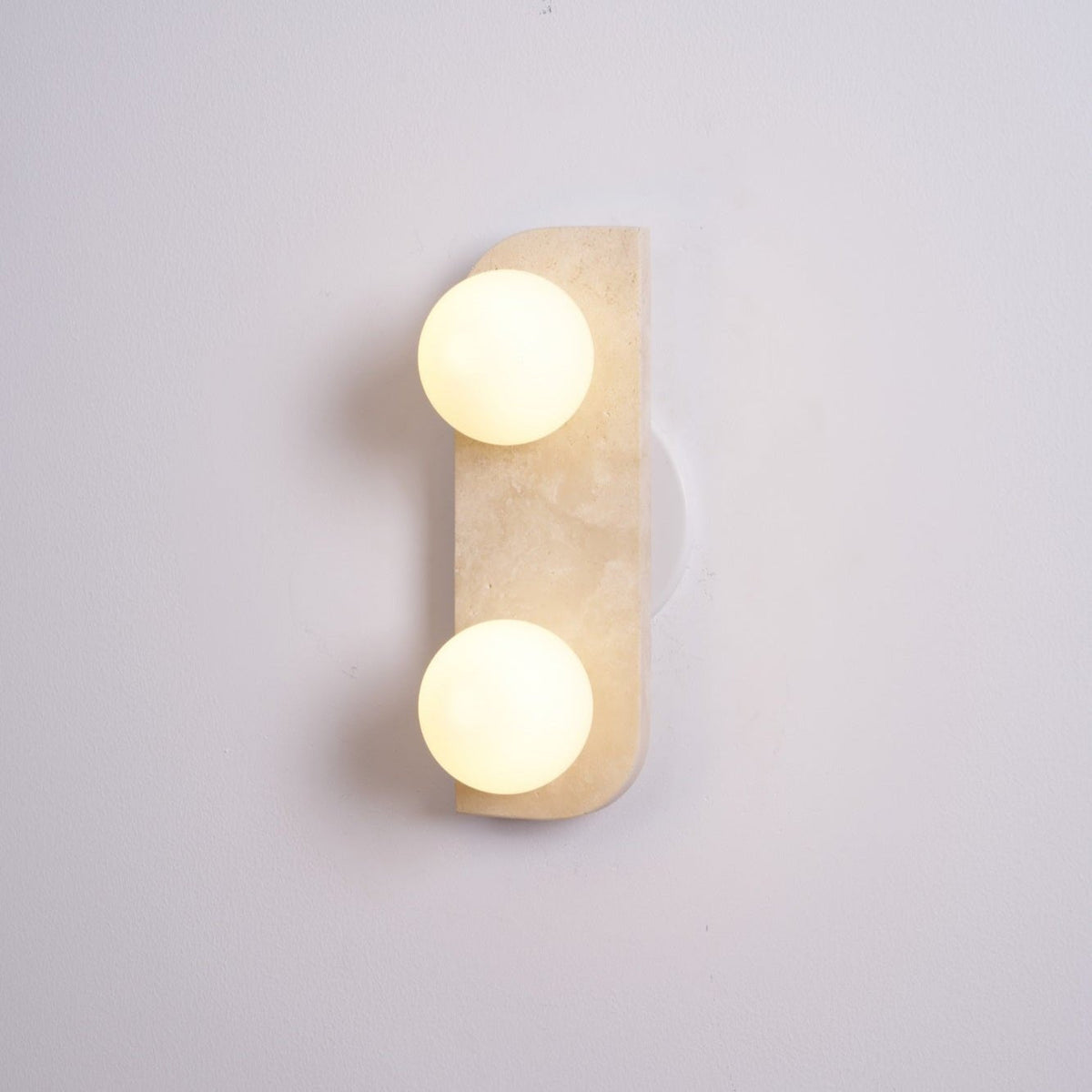 Elysian Travertine Wall Sconce with Glass Globes – Modern Natural Stone Lighting