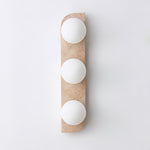 Elysian Travertine Wall Sconce with Glass Globes – Modern Natural Stone Lighting