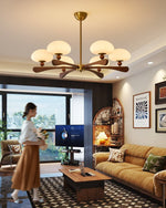 Evander Ray Modern Wood and Brass Chandelier with Glass Shades