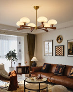 Evander Ray Modern Wood and Brass Chandelier with Glass Shades