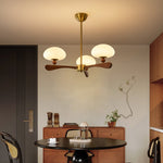 Evander Ray Modern Wood and Brass Chandelier with Glass Shades