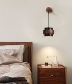 Event Horizon Wall Sconce in Black Travertine and Walnut