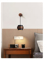 Event Horizon Wall Sconce in Black Travertine and Walnut