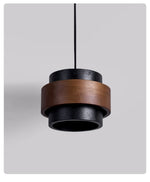 Event Horizon Wall Sconce in Black Travertine and Walnut