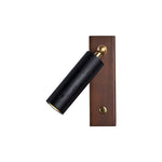 Event Horizon Adjustable Wall Sconce in Black Travertine and Brass