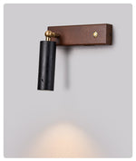Event Horizon Adjustable Wall Sconce in Black Travertine and Brass