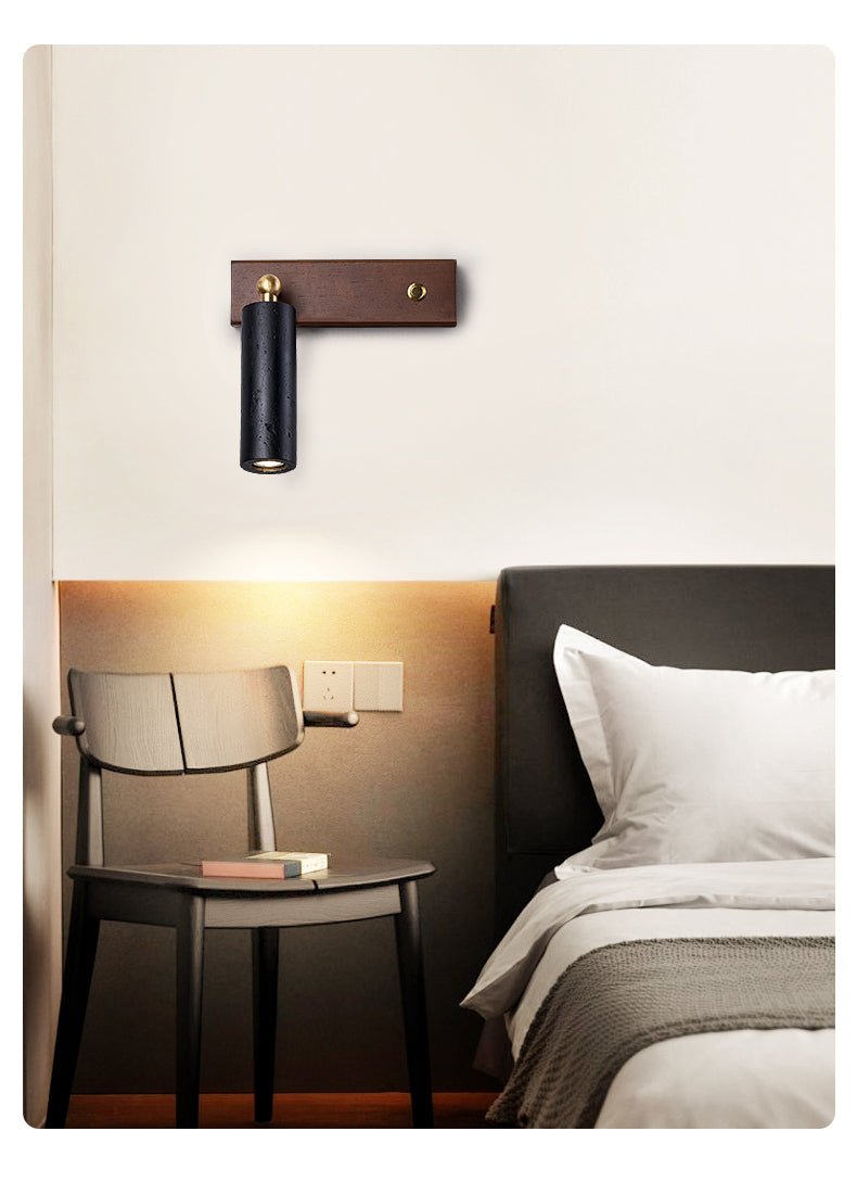 Event Horizon Adjustable Wall Sconce in Black Travertine and Brass