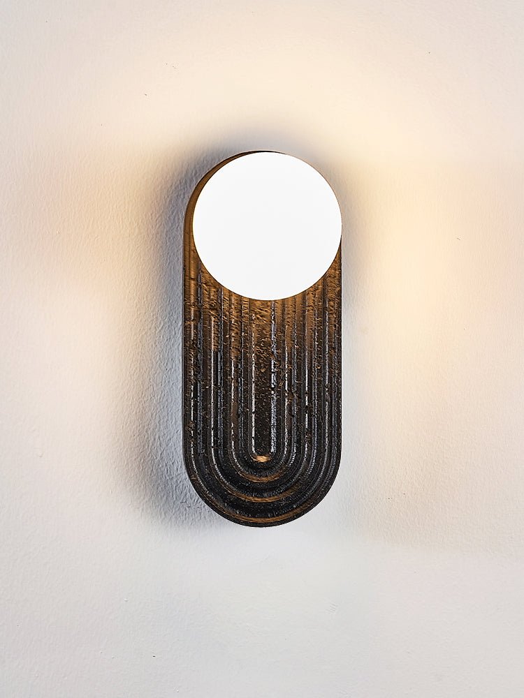 Eventide Orb Wall Sconce in Black Travertine with Opal Glass Globe