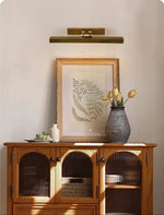 Everett Brass Swing Arm Wall Sconce for Modern Interiors