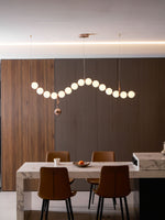 Ezrah Modern Linear LED Pendant Light – Frosted Glass Orbs
