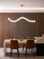 Ezrah Modern Linear LED Pendant Light – Frosted Glass Orbs