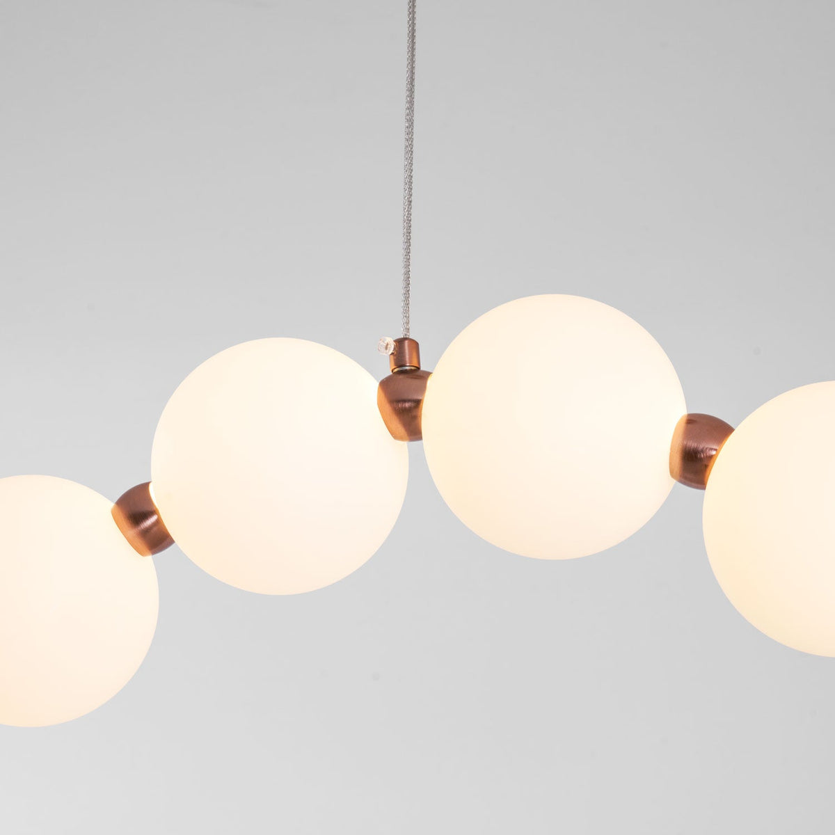 Ezrah Modern Linear LED Pendant Light – Frosted Glass Orbs