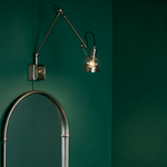 Flex Arm Wall Sconce with Adjustable Metal Shade for Modern Interiors