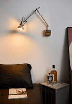 Flex Arm Wall Sconce with Adjustable Metal Shade for Modern Interiors