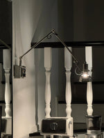 Flex Arm Wall Sconce with Adjustable Metal Shade for Modern Interiors