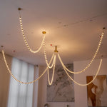 Gabriel Gold Crystal Chandelier – Sculptural LED Pendant for Modern Interiors