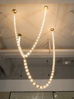 Gabriel Gold Crystal Chandelier – Sculptural LED Pendant for Modern Interiors