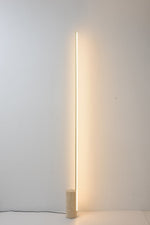 Linear LED Floor Lamp with Travertine Base for Modern Interiors