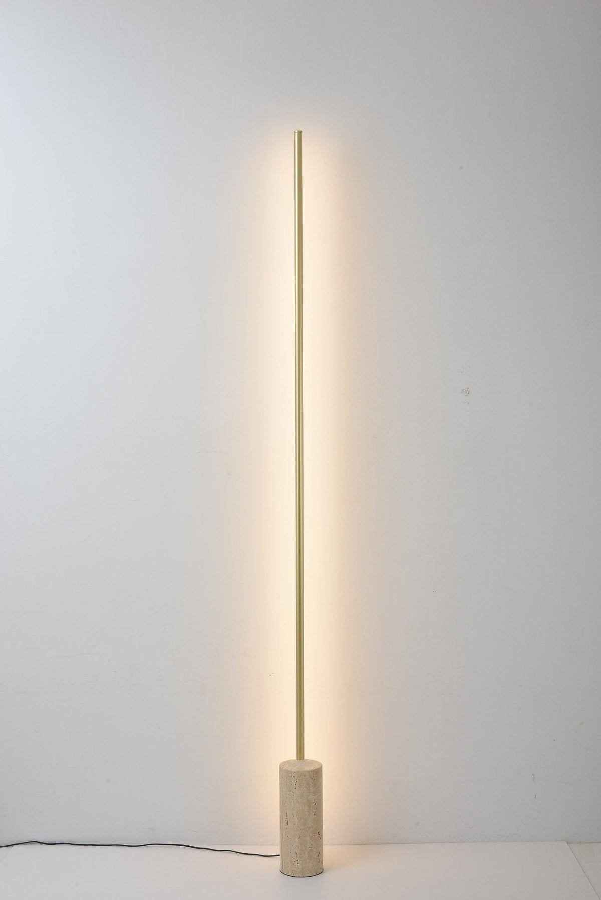 Linear LED Floor Lamp with Travertine Base for Modern Interiors