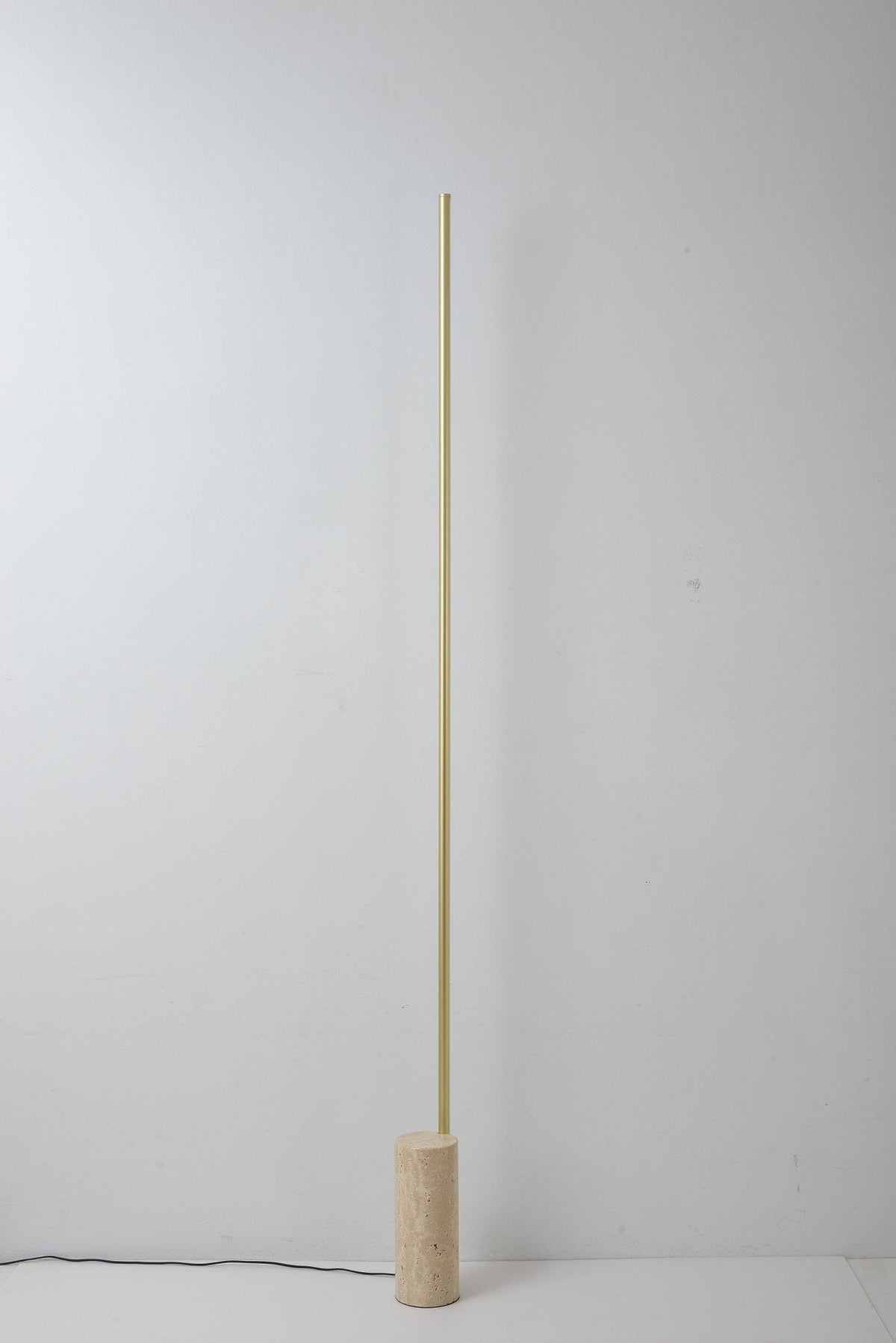 Linear LED Floor Lamp with Travertine Base for Modern Interiors