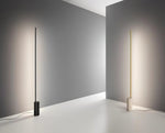 Linear LED Floor Lamp with Travertine Base for Modern Interiors