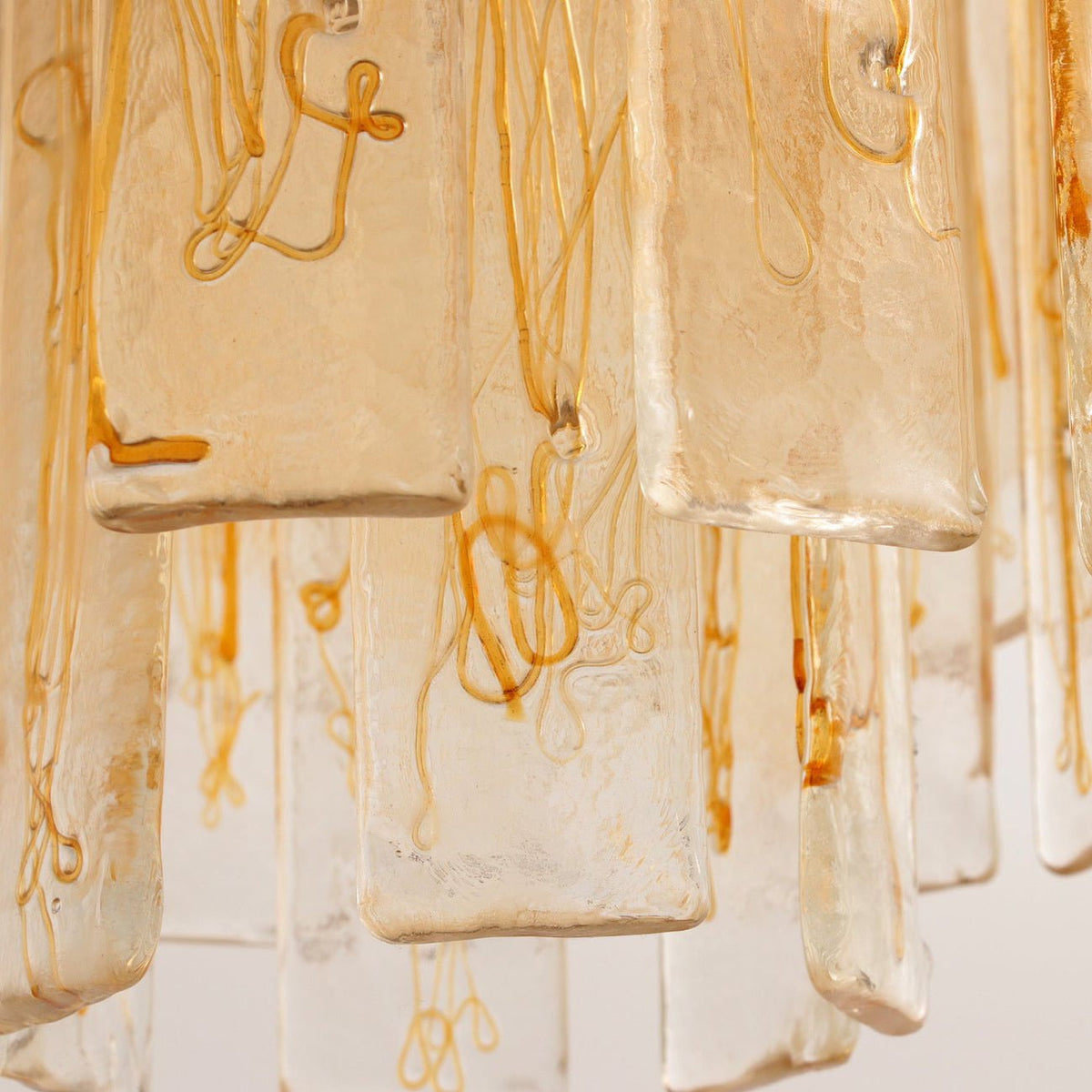 Amber Glass Chandelier with Brass Chain – Modern Luxury Lighting for Dining and Living Spaces