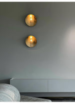 Golden Aura LED Wall Sconce – Modern Brass Finish Architectural Lighting