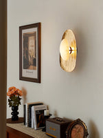 Aurea Alabaster Wall Sconce in Hand-Hammered Brass
