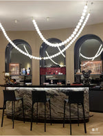 Halti Necklace Acrylic Chandelier with Gold Accents and Integrated LED