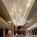 Halti Necklace Acrylic Chandelier with Gold Accents and Integrated LED