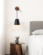 Jorren Wall Sconce in Black Travertine and Walnut