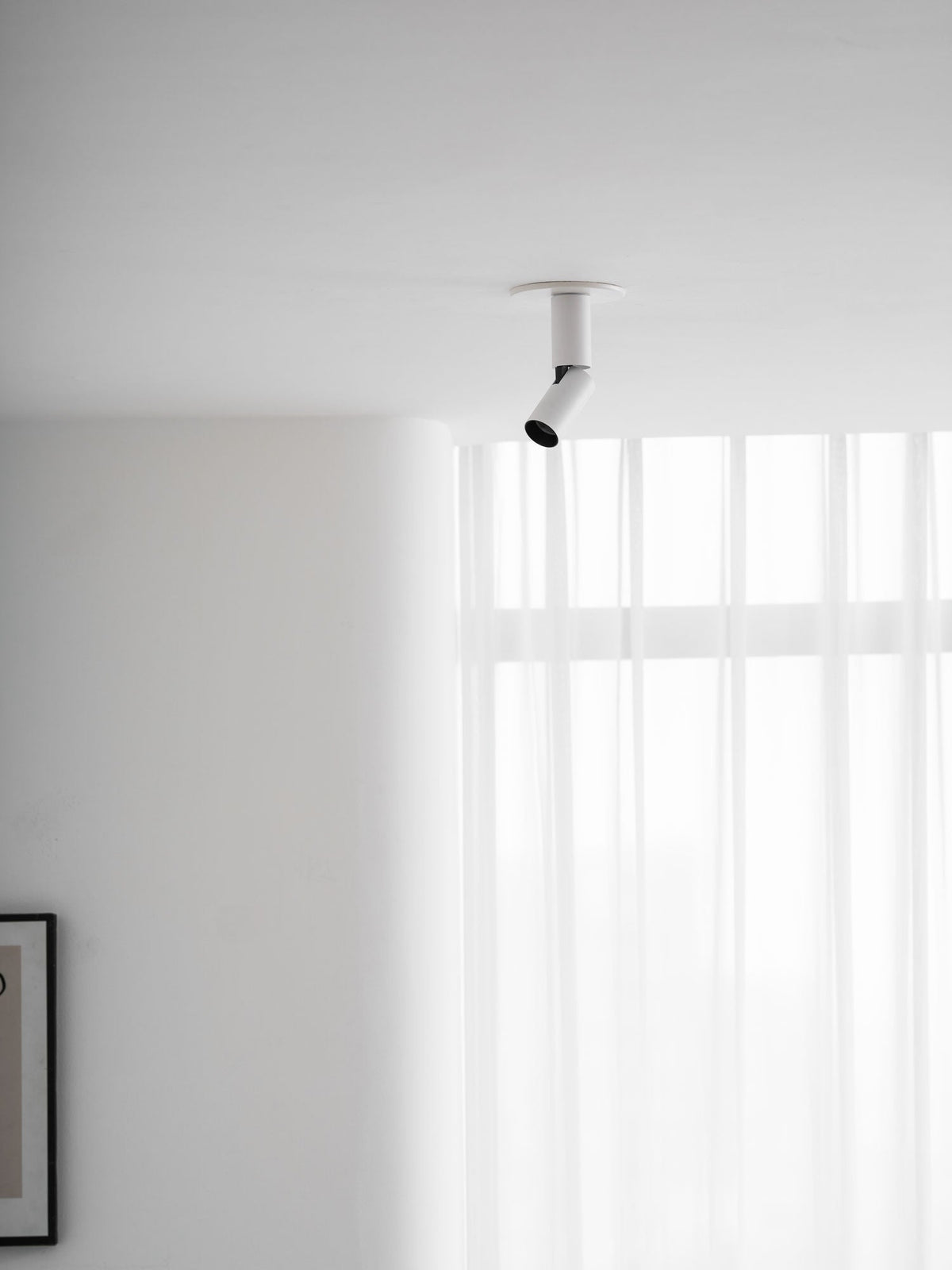 Julian Adjustable Surface Spot Light – Slim LED Downlight in Black or White