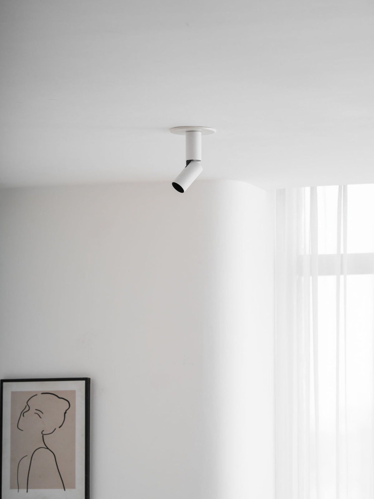 Julian Adjustable Surface Spot Light – Slim LED Downlight in Black or White