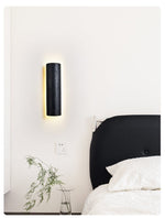 Kaedran Black Travertine LED Wall Sconce with Halo Backlighting